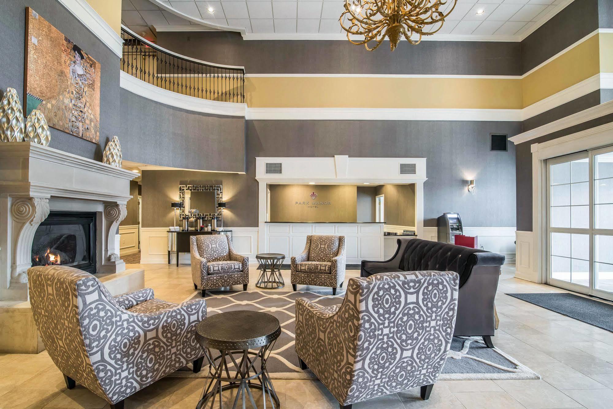 Park Manor Hotel Clifton Park Extérieur photo The lobby of the Best Western Premier Executive Residency Royal Palm Beach